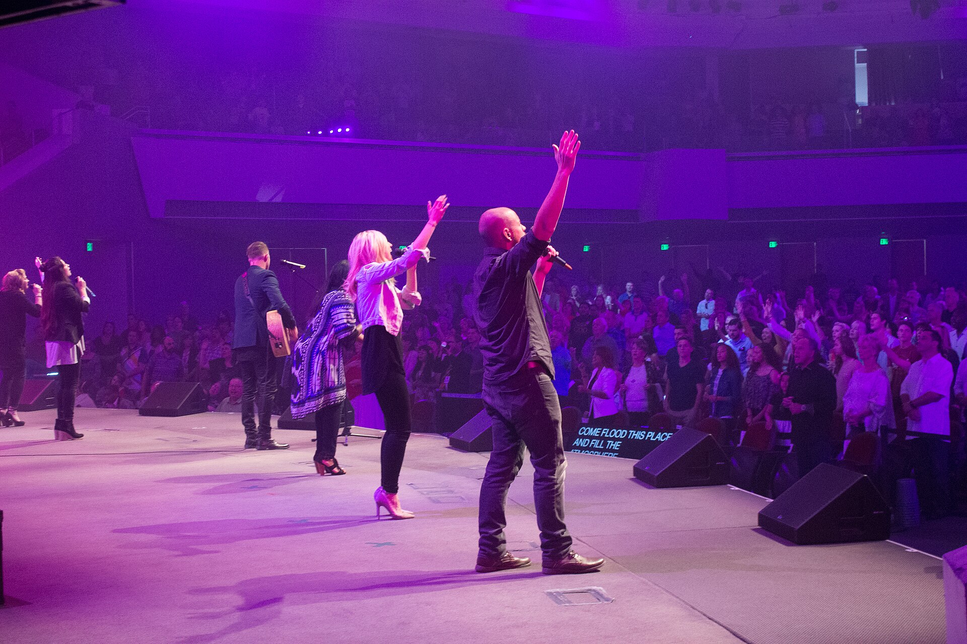 Congregation members participating in Bible-focused worship